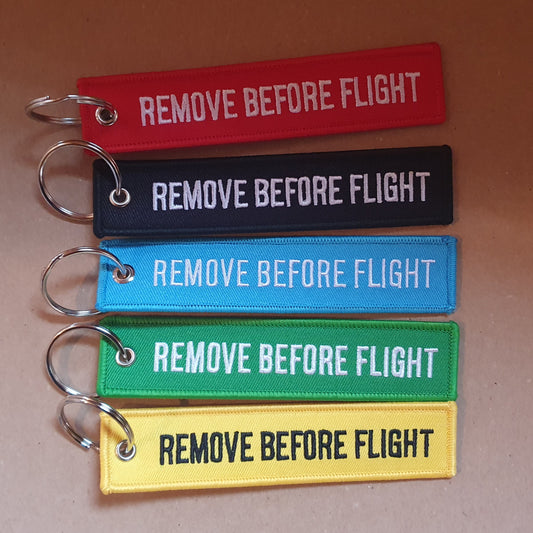 Remove Before Flight Schlüsselband